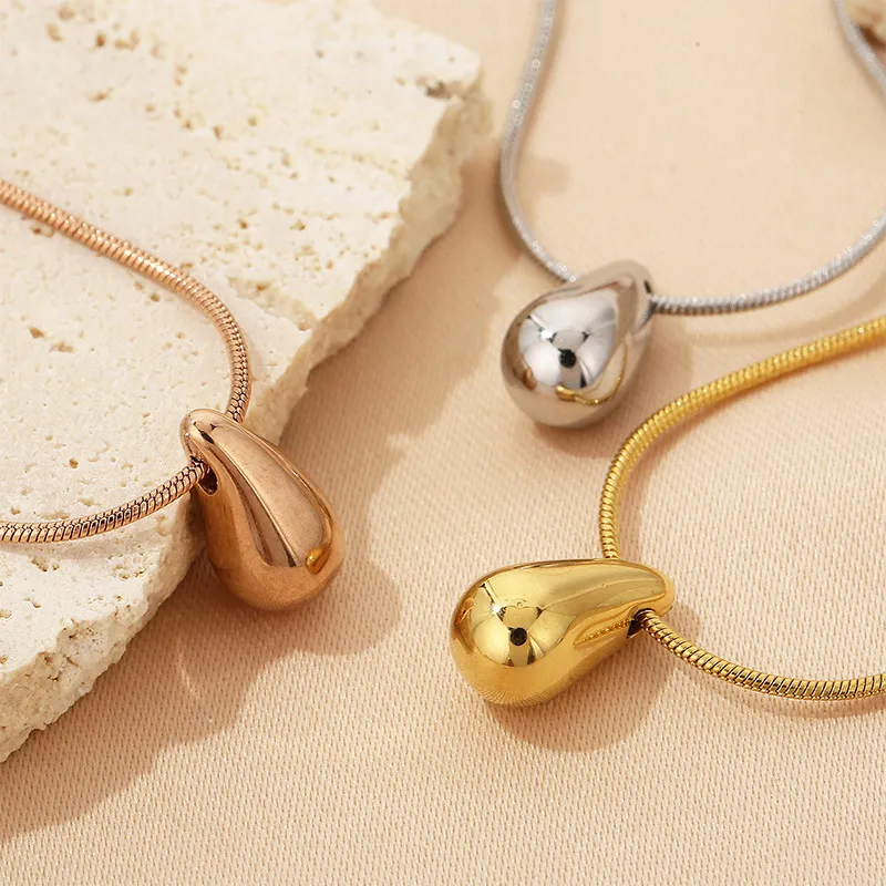 Trendy and Fashionable Stainless Steel Chubby Droplet Shaped Ring Bracelet Earring Necklace Four Piece Set