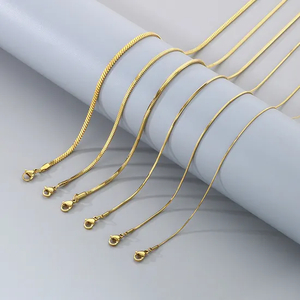 a Niche Design Slim Snake-Shaped Stainless Steel 18K Gold Vacuum-Plated Necklace
