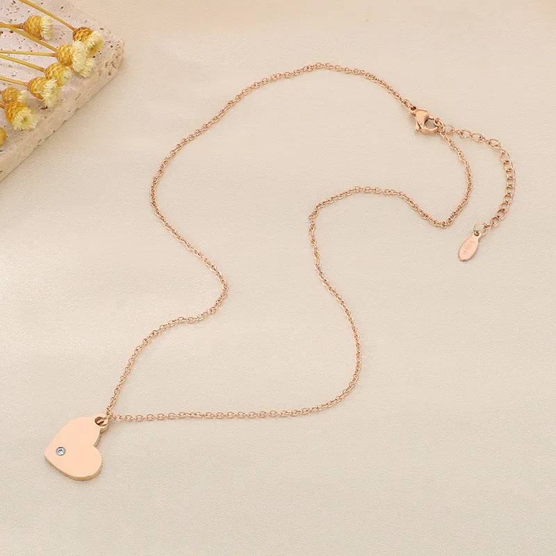 Simple Stainless Steel Circular Heart, Good Luck and Fortune Logo with Diamond Studded Pendant Necklace