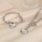 Fashionable and Minimalist Stainless Steel Smooth Heart Pendant with an Ot Buckle Bracelet Necklace Set