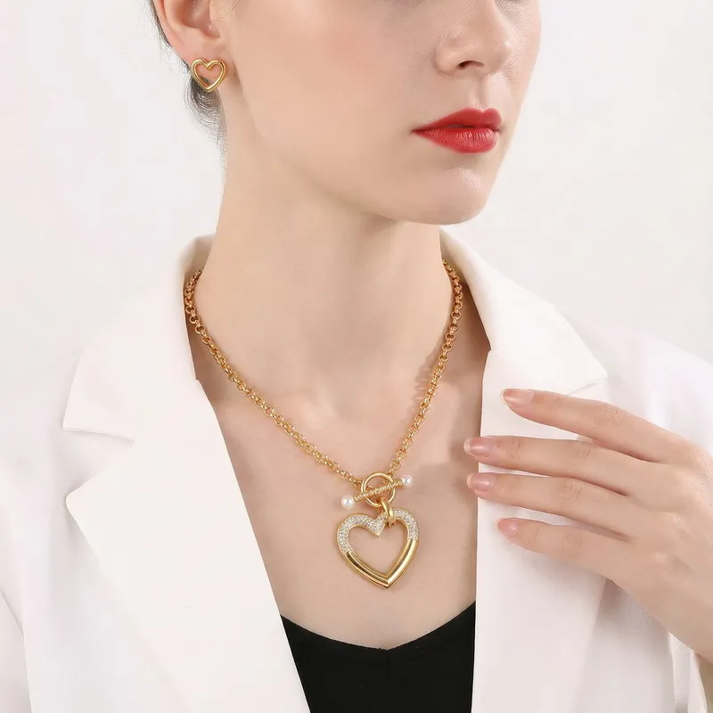 Fashionable Hollowed-out Diamond-Encrusted Heart Pendant Women's Stainless Steel Necklace and Earring Set