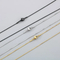 a Niche Design Slim Snake-Shaped Stainless Steel 18K Gold Vacuum-Plated Necklace