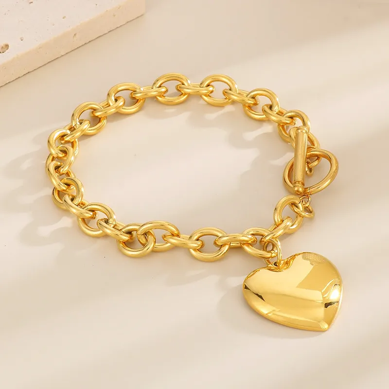 Fashionable and Minimalist Stainless Steel Smooth Heart Pendant with an Ot Buckle Bracelet Necklace Set