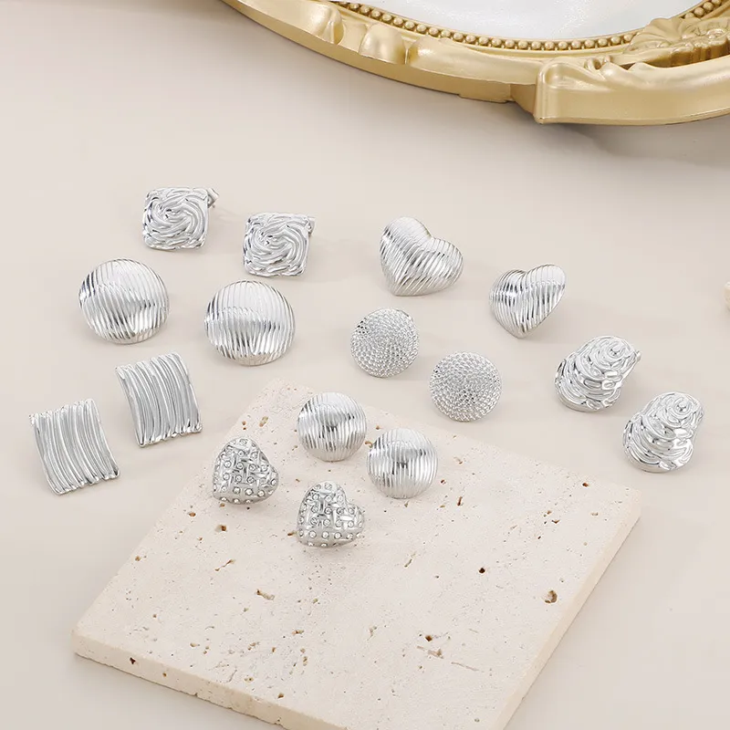 High-End Embossed Stainless Steel Earrings with Gold Accents