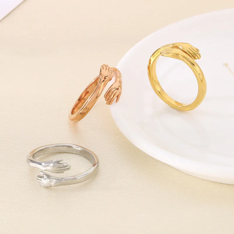 Rose Gold Plated Zircon Stone Hands Hug Stainless Steel Jewelry Ring