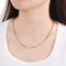 a Niche Design Slim Snake-Shaped Stainless Steel 18K Gold Vacuum-Plated Necklace