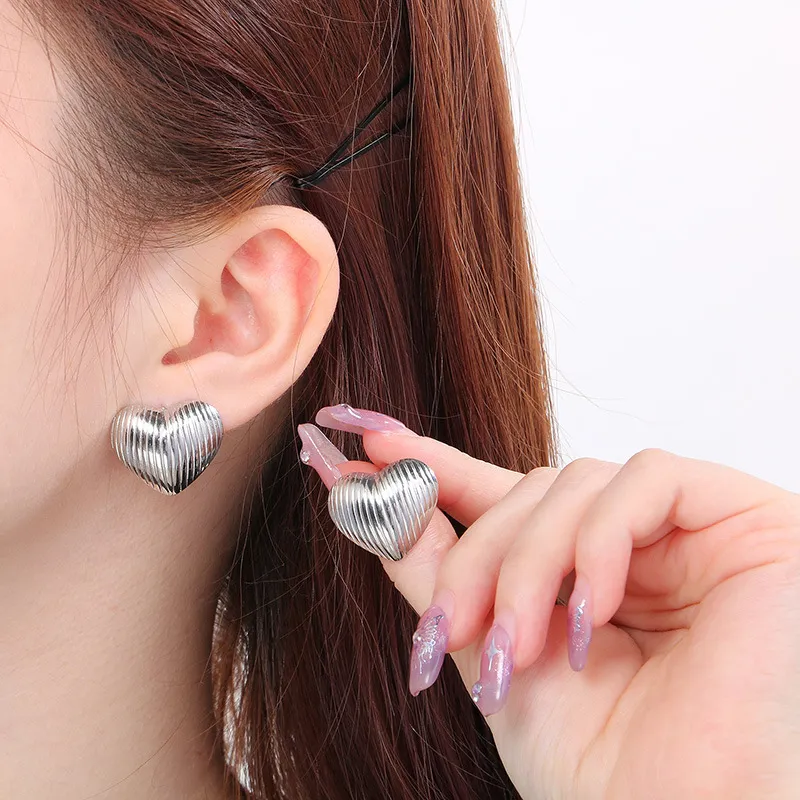 High-End Embossed Stainless Steel Earrings with Gold Accents