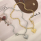 Hip-Hop Fashion Punk Style Stainless Steel Retro Heart-Shaped Pendant Ot Buckle Jewelry Women's Bracelet and Necklace Set