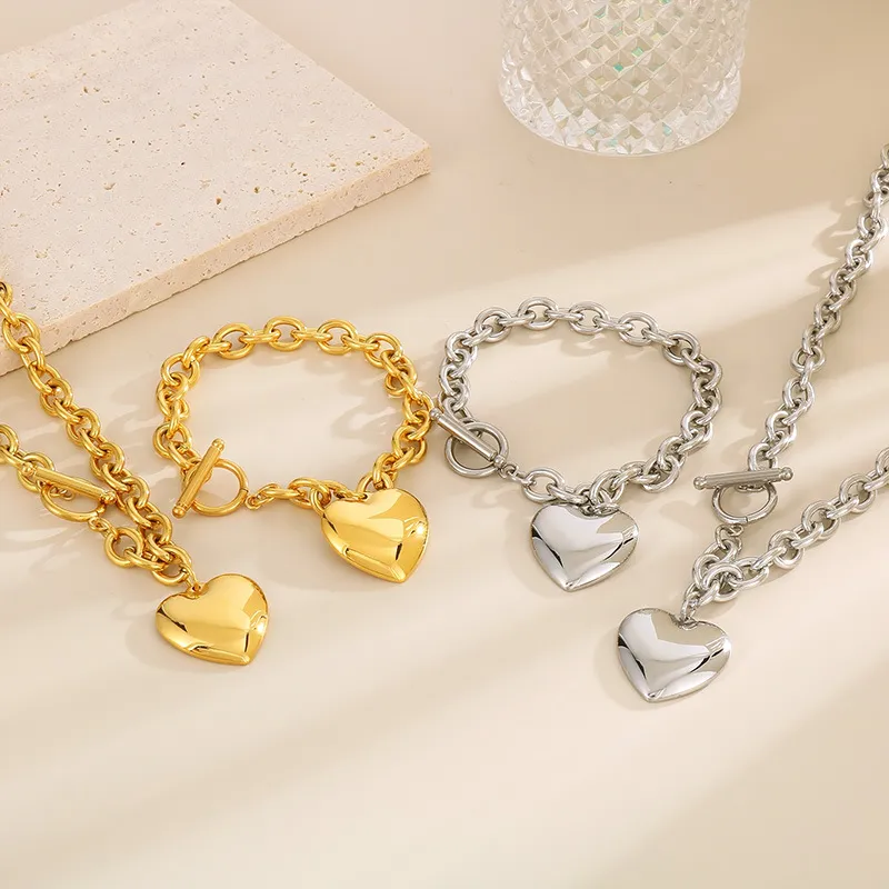 Fashionable and Minimalist Stainless Steel Smooth Heart Pendant with an Ot Buckle Bracelet Necklace Set