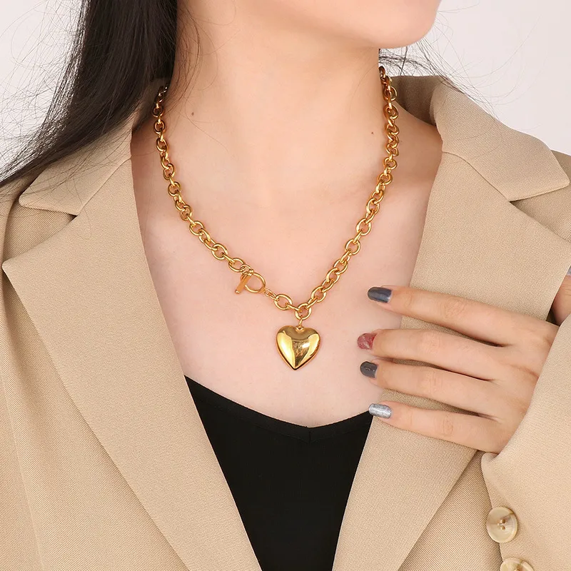 Fashionable and Minimalist Stainless Steel Smooth Heart Pendant with an Ot Buckle Bracelet Necklace Set