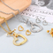 Fashionable Hollowed-out Diamond-Encrusted Heart Pendant Women's Stainless Steel Necklace and Earring Set