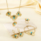 Retro Hollow Floral Core Flower Jewelry Set Tassel Stainless Steel 4-Piece Jewelry Set