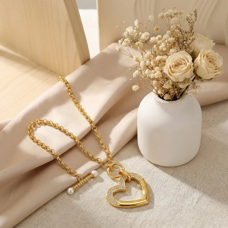 Fashionable Hollowed-out Diamond-Encrusted Heart Pendant Women's Stainless Steel Necklace and Earring Set
