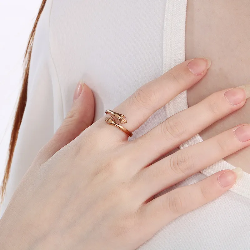 Rose Gold Plated Zircon Stone Hands Hug Stainless Steel Jewelry Ring
