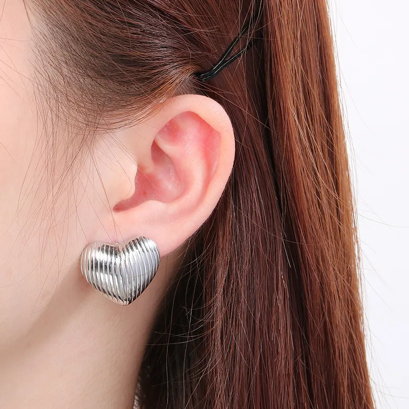 High-End Embossed Stainless Steel Earrings with Gold Accents