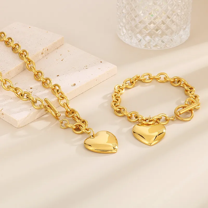 Fashionable and Minimalist Stainless Steel Smooth Heart Pendant with an Ot Buckle Bracelet Necklace Set