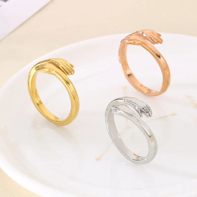Rose Gold Plated Zircon Stone Hands Hug Stainless Steel Jewelry Ring
