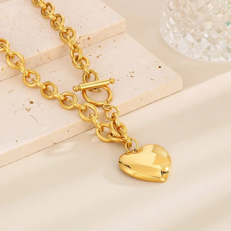 Fashionable and Minimalist Stainless Steel Smooth Heart Pendant with an Ot Buckle Bracelet Necklace Set
